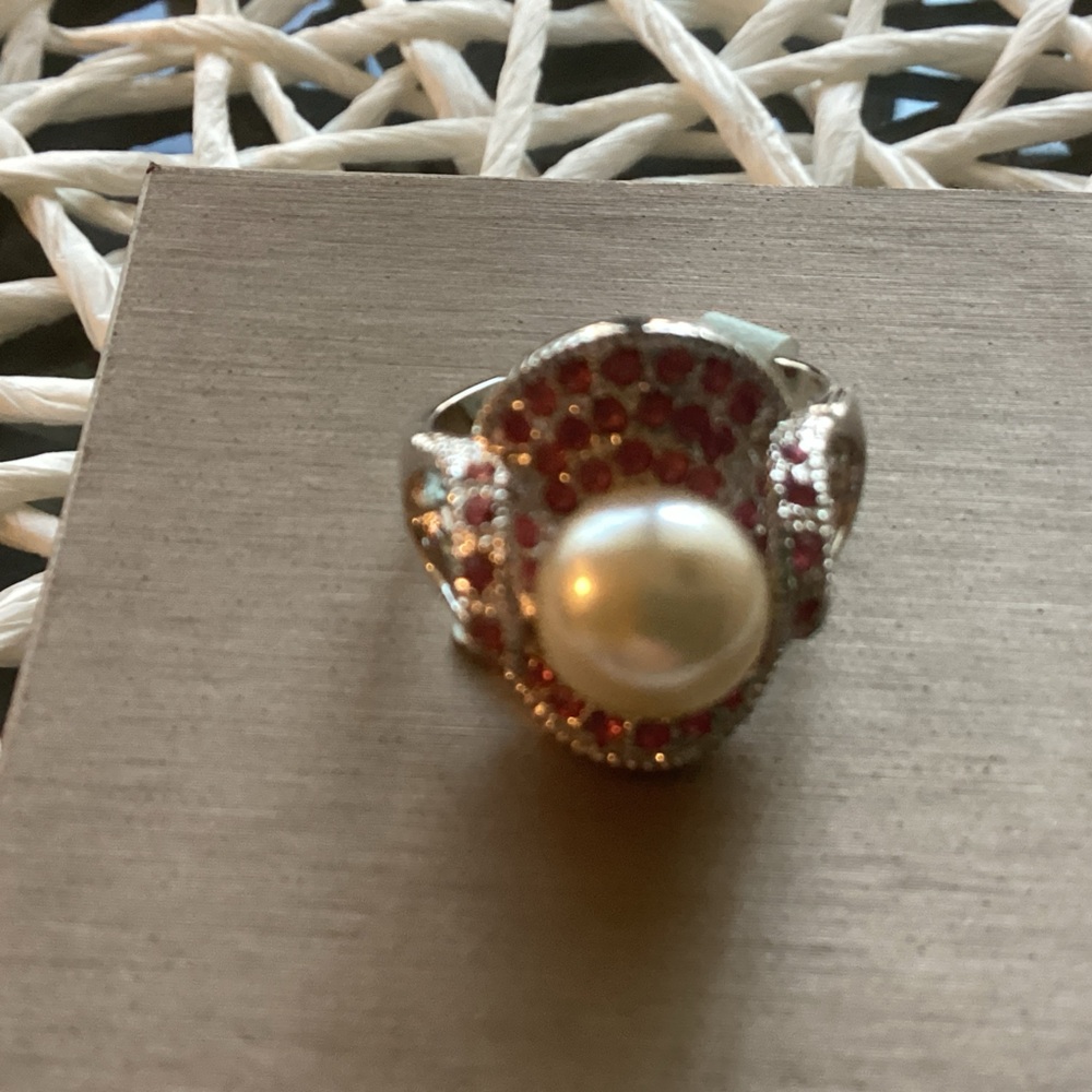 Elegant Pearl and Red Gemstone Ring by Lauren Adam’s.